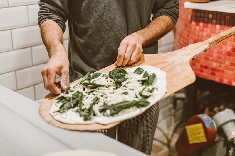 Veggie white pizza with spinach and ricotta